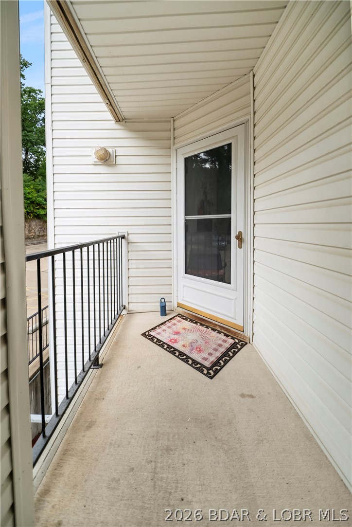 40 Lighthouse Road, Unit 301 Lake Ozark, MO 65049 - Photo 6 of 32 Corner unit boasts privacy plus add'l square foota