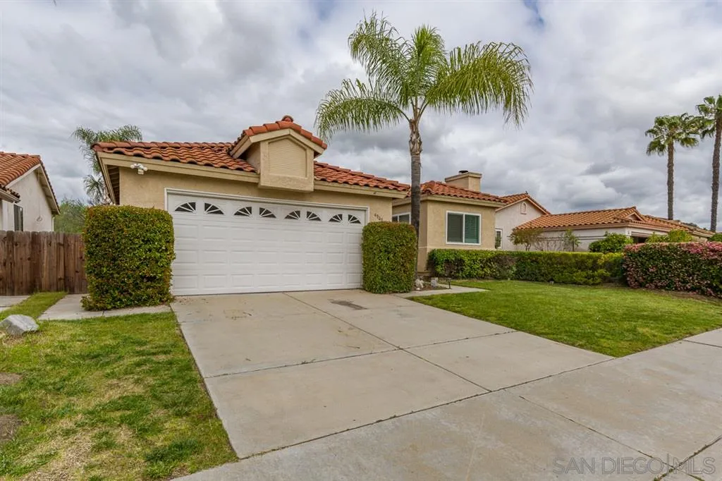 4968 Dulin Road Fallbrook, CA 92028 - Photo 2 of 25 a front view of a house with garden