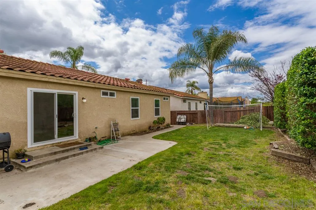 4968 Dulin Road Fallbrook, CA 92028 - Photo 23 of 25 a front view of house with yard and green space