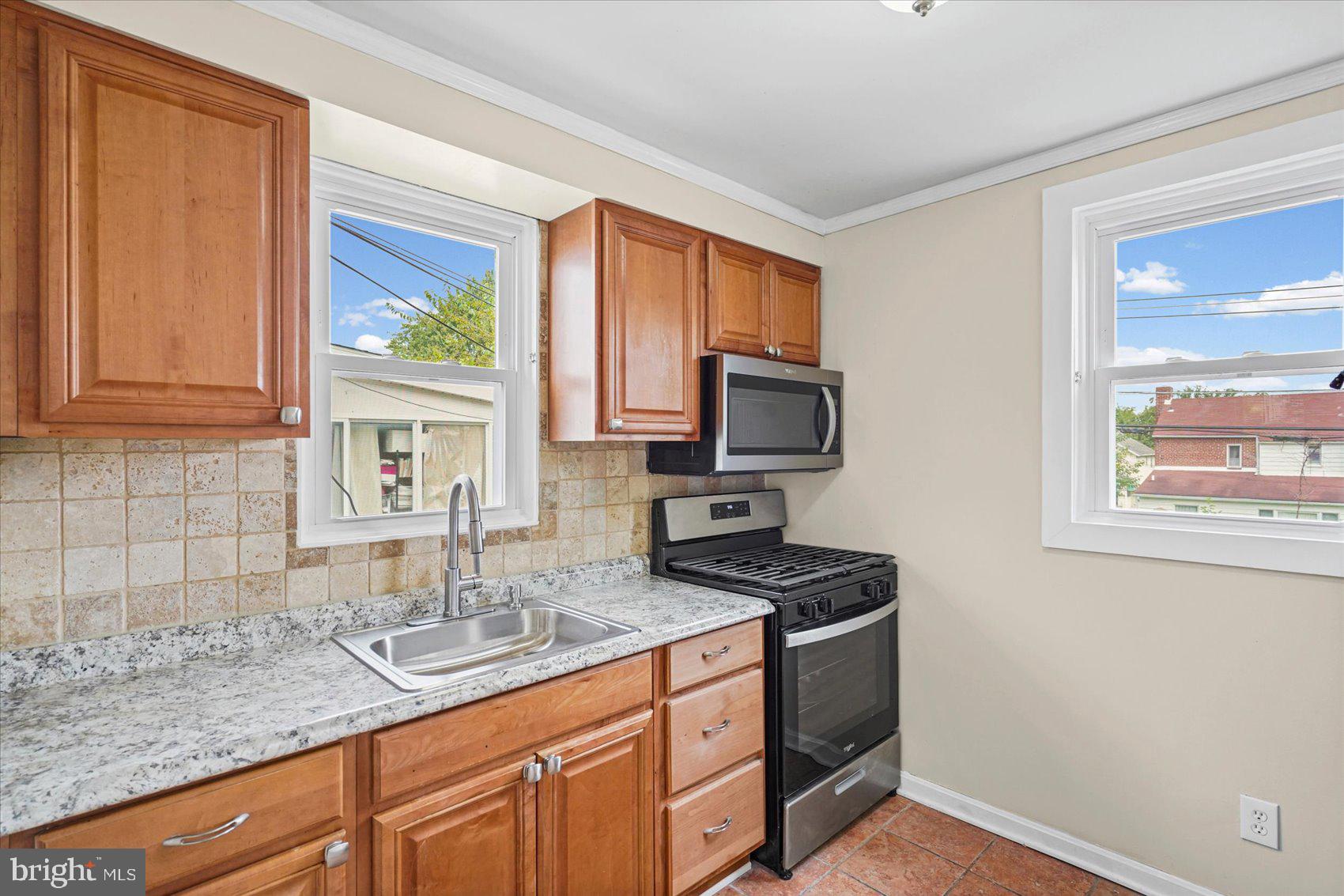 4228 Thorncliff Road Nottingham, MD 21236 - Photo 18 of 42 Bright kitchen with modern finishes.