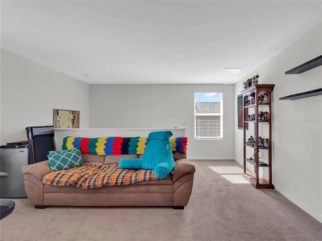 a bedroom with a bed and a cabinets