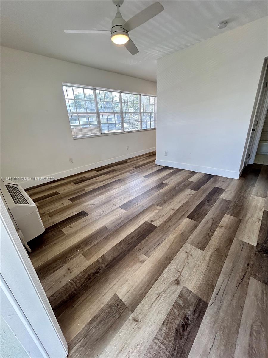 571 Northeast 67th Street, Unit 1 Miami, FL 33138 - Photo 2 of 13 a view of an empty room and window