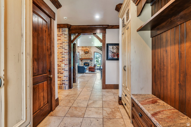 811 South High Ridge Drive Alpine, UT 84004 - Photo 36 of 98 Hallway with stone tile floors and recessed lighting