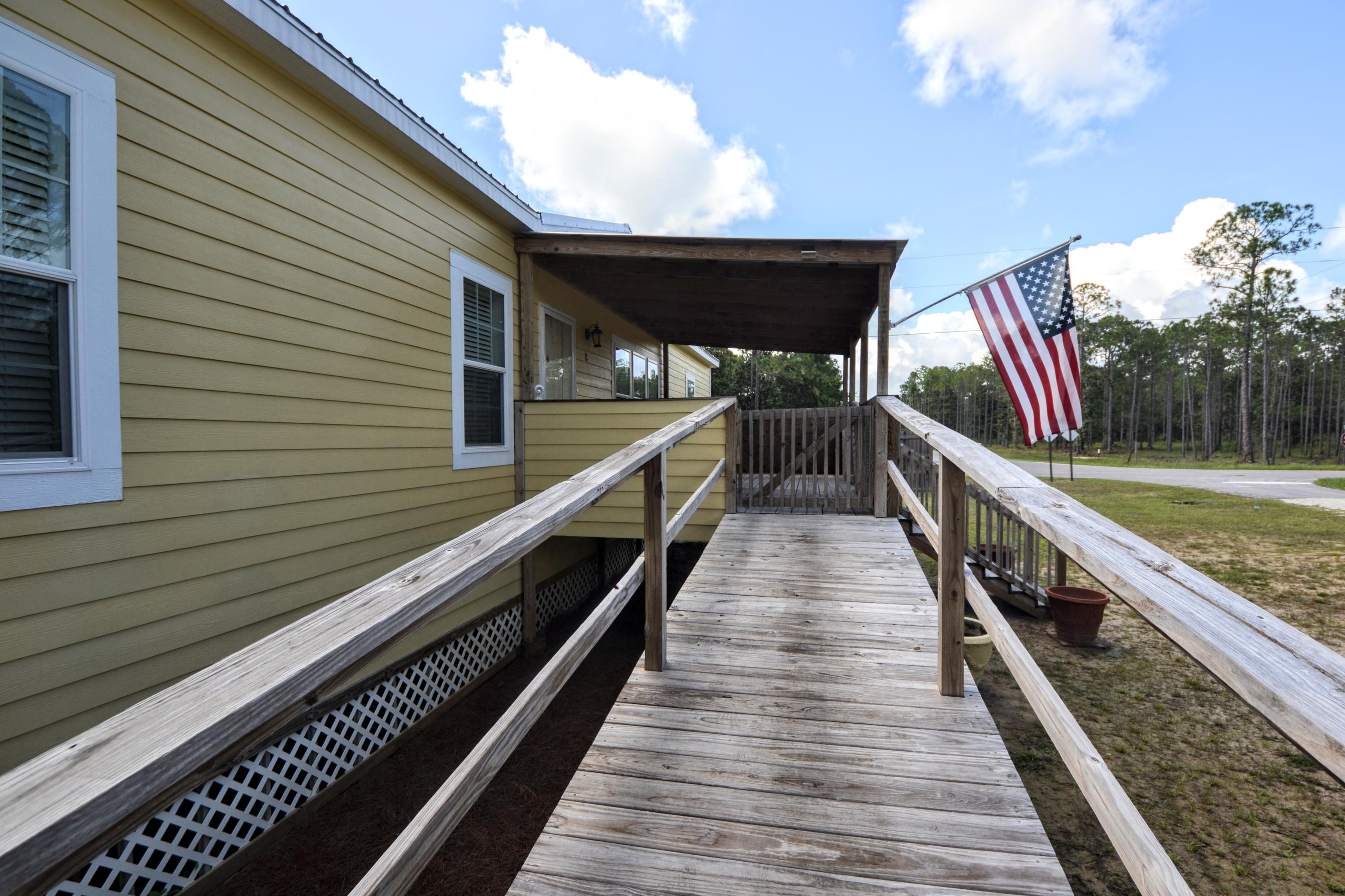 16 17th Street Santa Rosa Beach, FL 32459 - Photo 13 of 40 a view of balcony with wooden floor and fence
