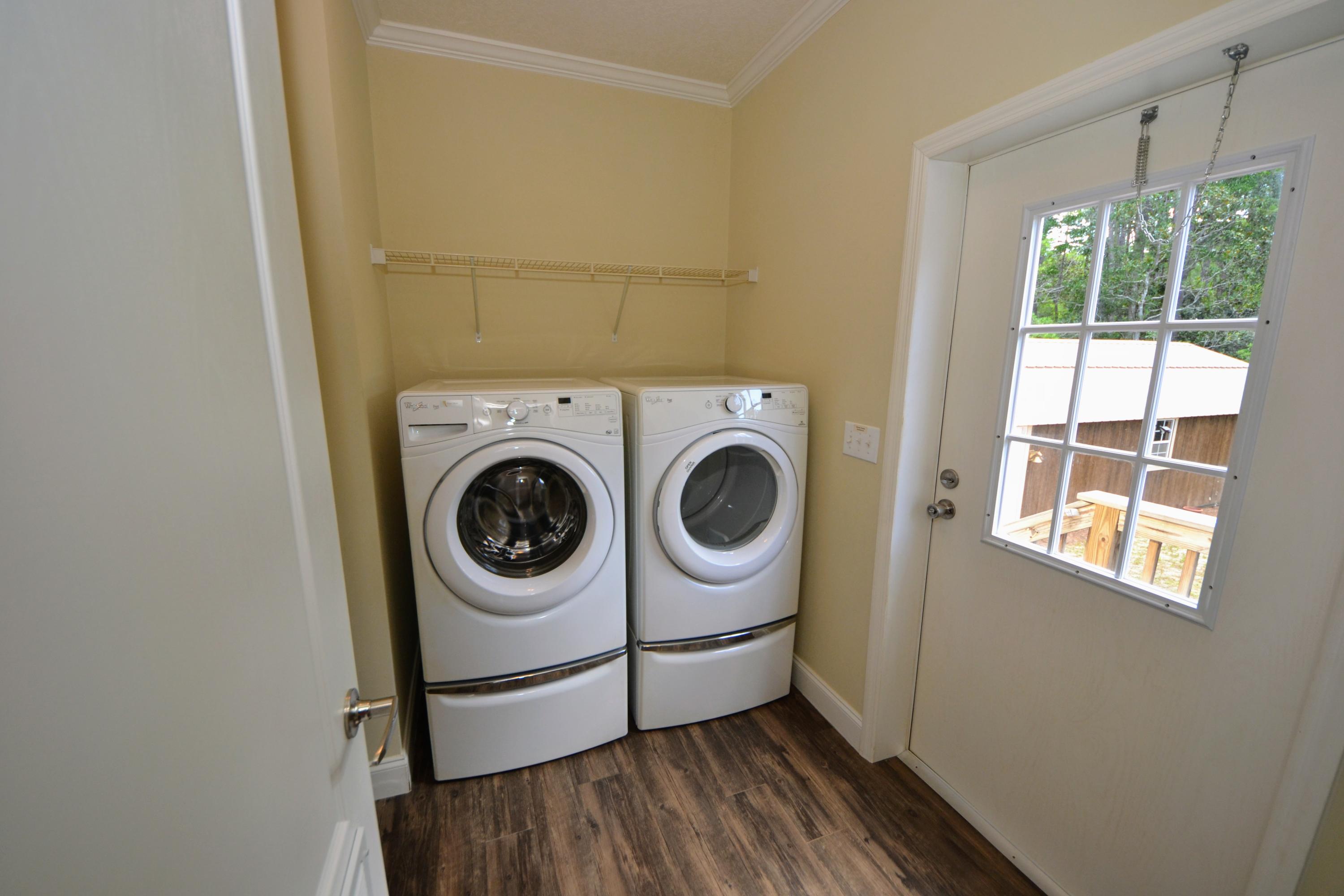 16 17th Street Santa Rosa Beach, FL 32459 - Photo 33 of 40 a utility room with dryer and washer