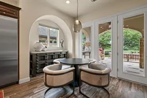 a living room with furniture a window and a fireplace