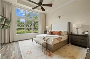 a bed room with a bed and a window