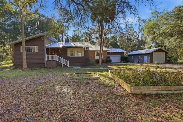 front view of a house with a tiny house
