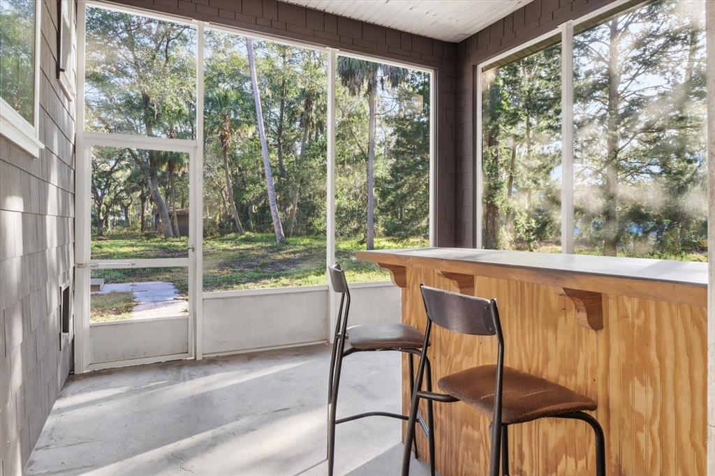 11 Patricia Road Yankeetown, FL 34498 - Photo 22 of 30 a view of a room with balcony and furniture