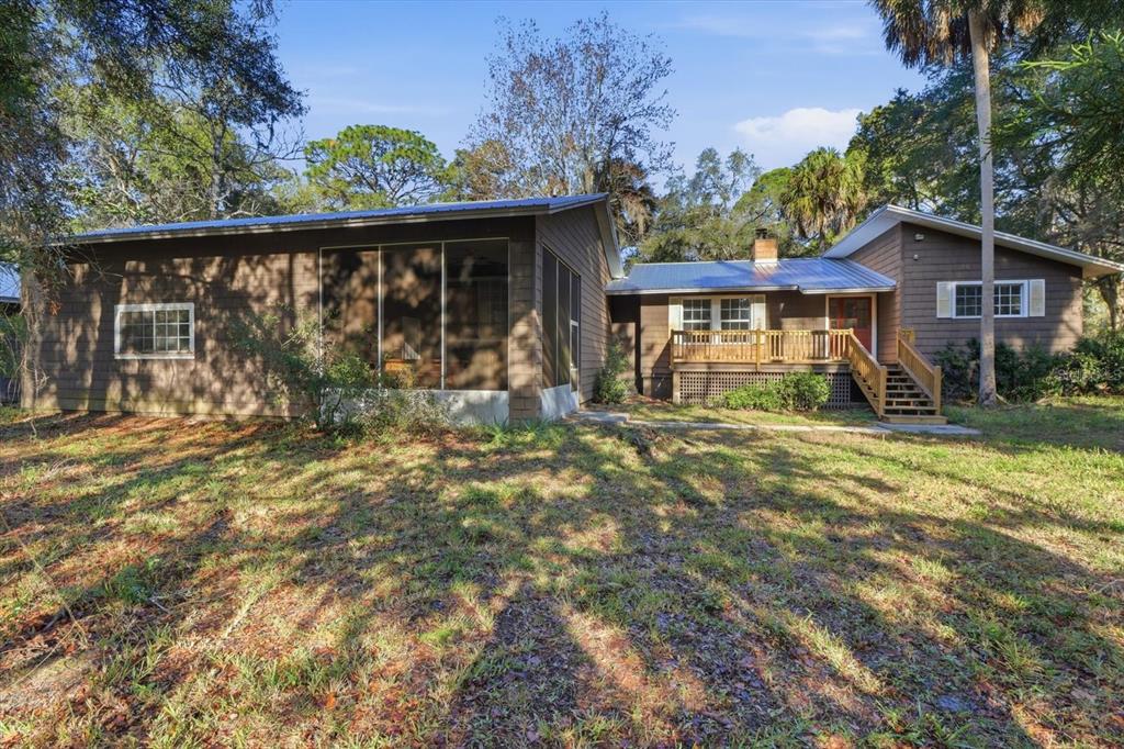11 Patricia Road Yankeetown, FL 34498 - Photo 26 of 30 front view of house with a yard