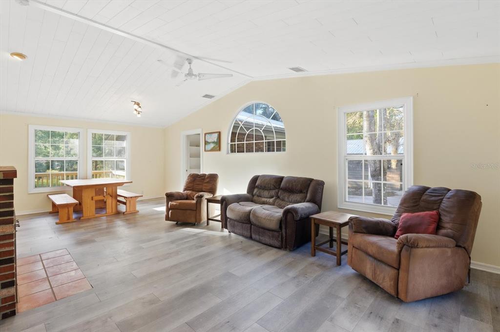 11 Patricia Road Yankeetown, FL 34498 - Photo 5 of 30 a living room with furniture and a large window