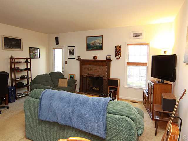 Living room is extra large - with space for an office nook. Wood burning fireplace. Living Room