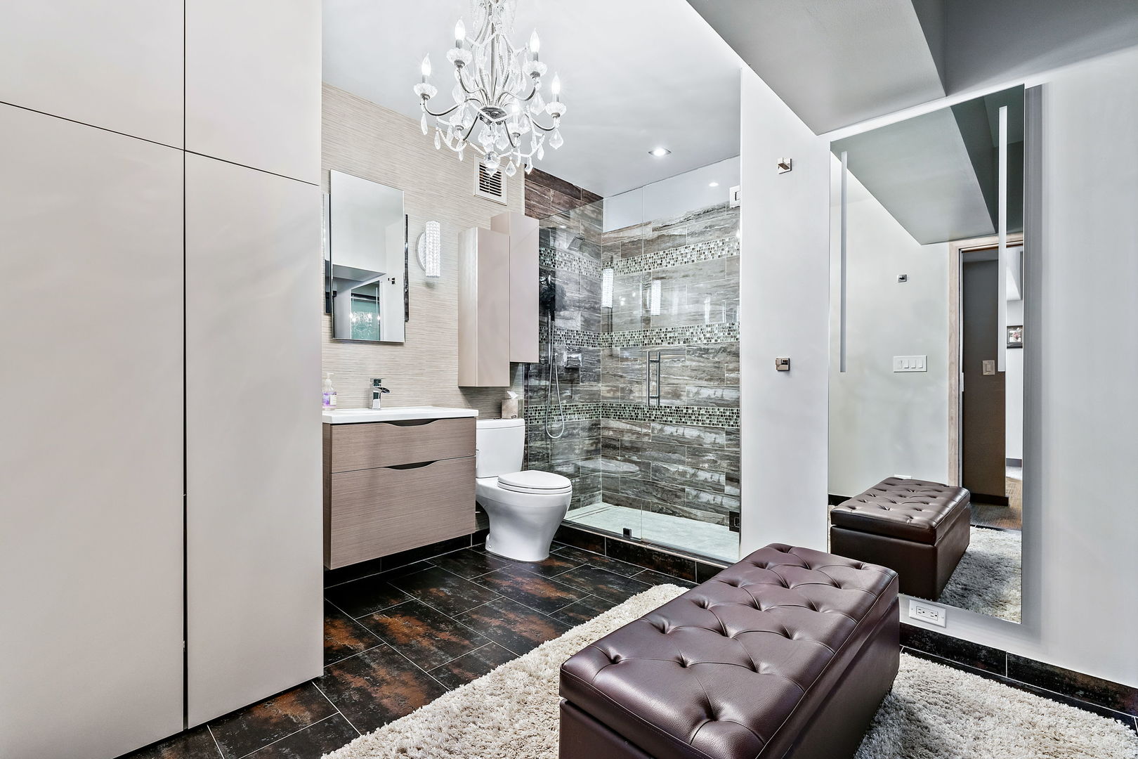 175 East Delaware Place, Unit 5412 Chicago, IL 60611 - Photo 15 of 20 a bathroom with a toilet sink and shower