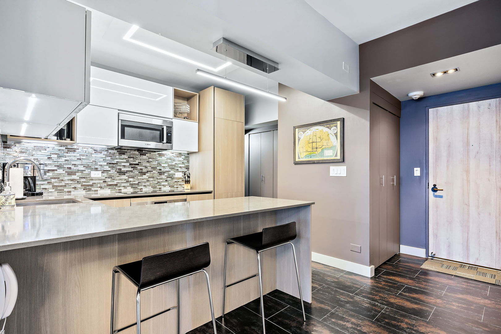 175 East Delaware Place, Unit 5412 Chicago, IL 60611 - Photo 8 of 20 a kitchen with stainless steel appliances a counter space a sink and cabinets