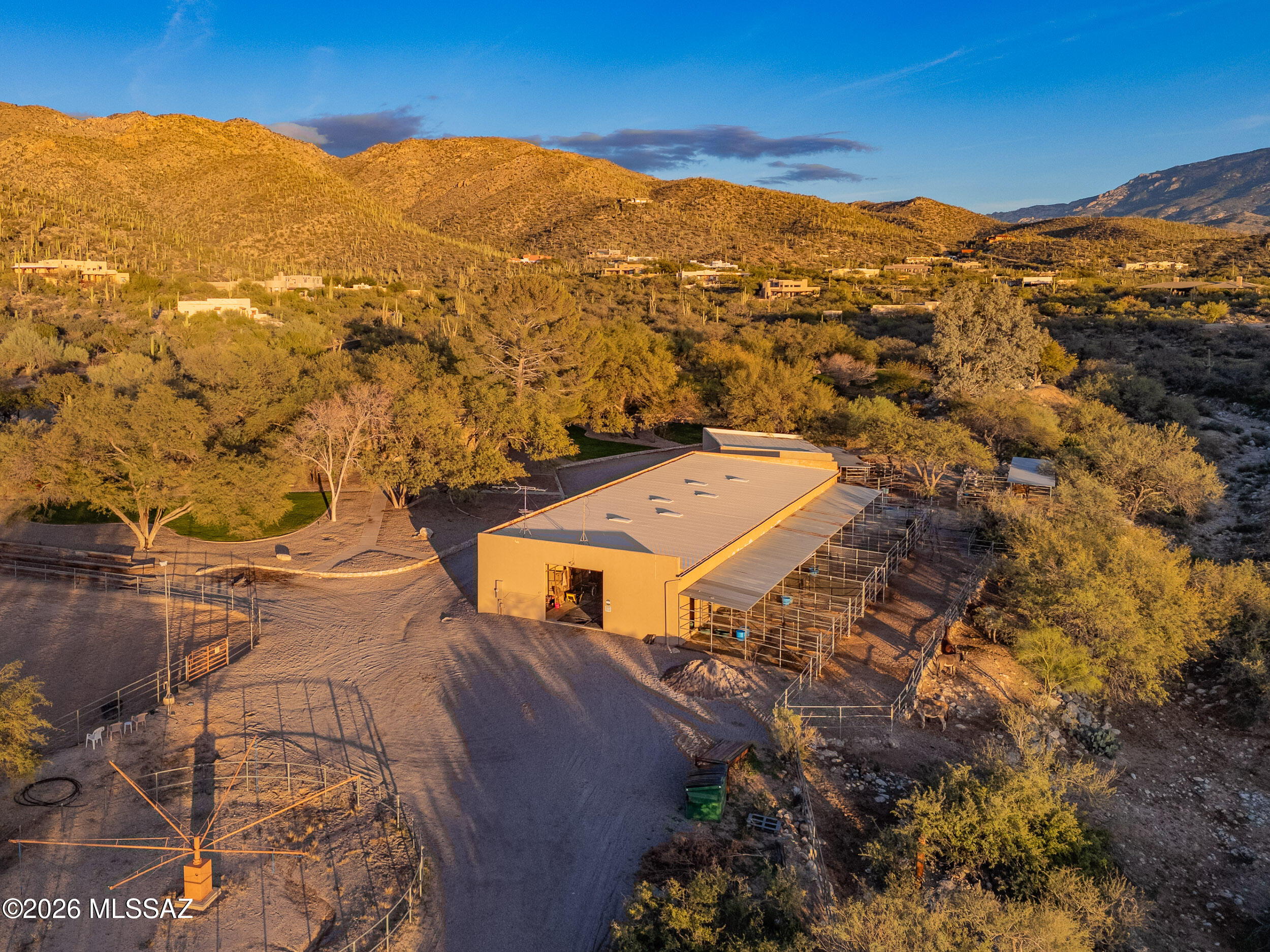 13630 East Sahuaro Sunset Road Tucson, AZ 85749 - Photo 40 of 47 a view of a city with mountains in the background
