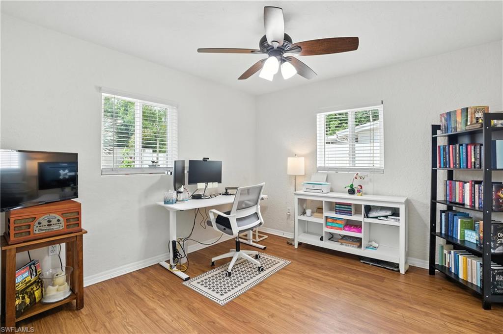 1423 Charles Road Fort Myers, FL 33919 - Photo 16 of 26 Guest Bedroom or Office Space with wood finished floors, plenty of natural light, and ceiling fan