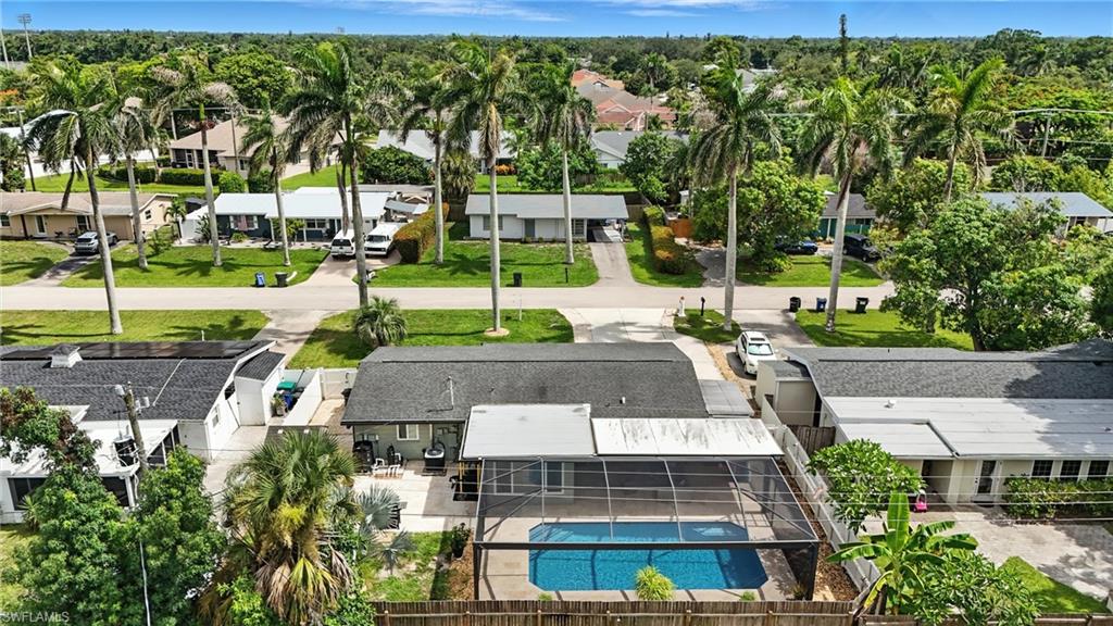 1423 Charles Road Fort Myers, FL 33919 - Photo 24 of 26 Aerial perspective of suburban area with a pool