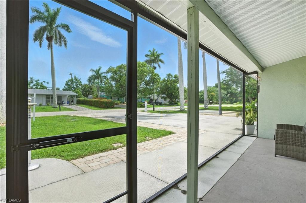 1423 Charles Road Fort Myers, FL 33919 - Photo 7 of 26 View of unfurnished sunroom