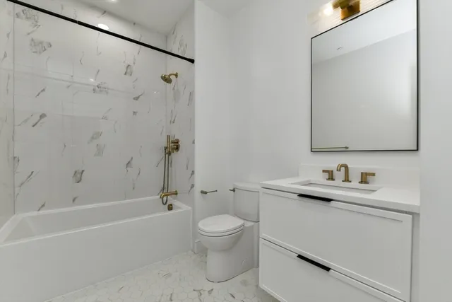 a front view of a building with a street