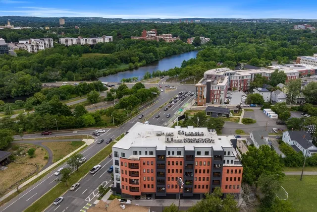 a balcony with table and chairs