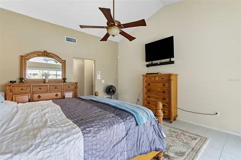 a room with furniture a fireplace and a chandelier