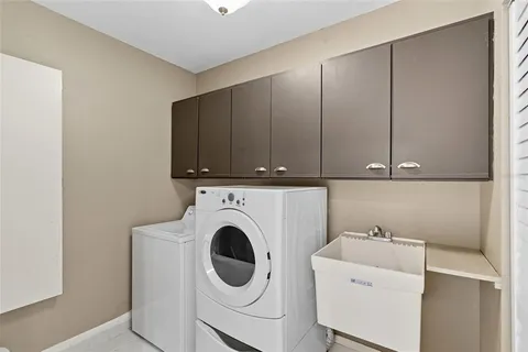 a view of outdoor space with swimming pool and patio