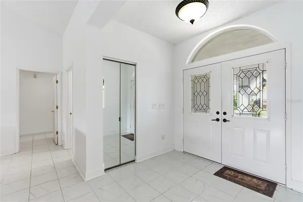 wooden floor with white walls