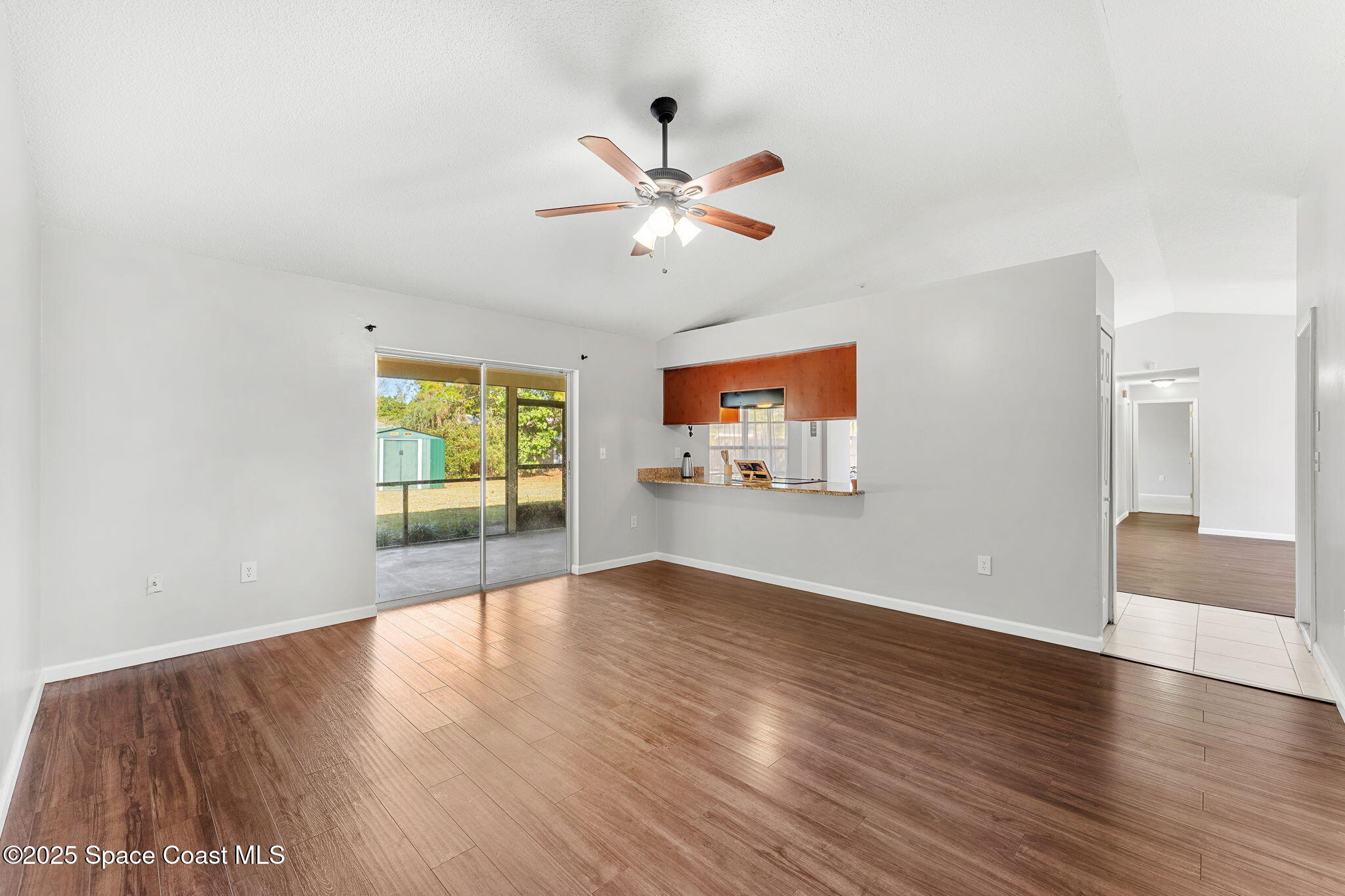4852 Alfred Street Cocoa, FL 32927 - Photo 32 of 59 wooden floor in an empty room with a window