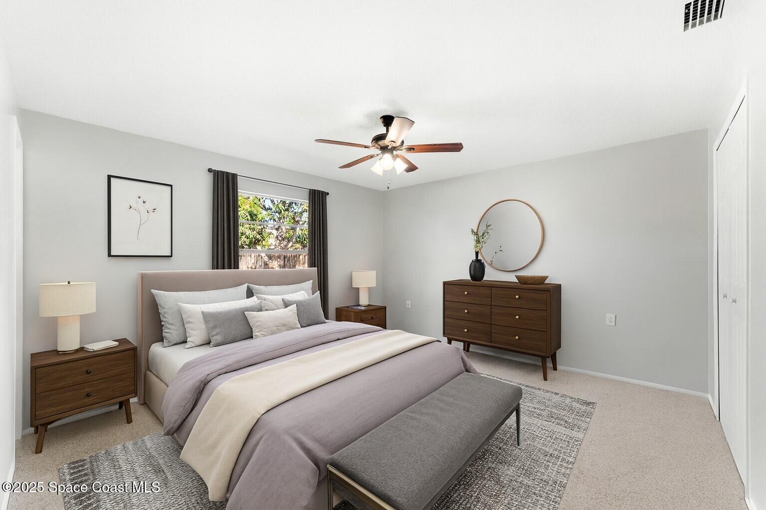 4852 Alfred Street Cocoa, FL 32927 - Photo 36 of 59 a bedroom with a bed and window