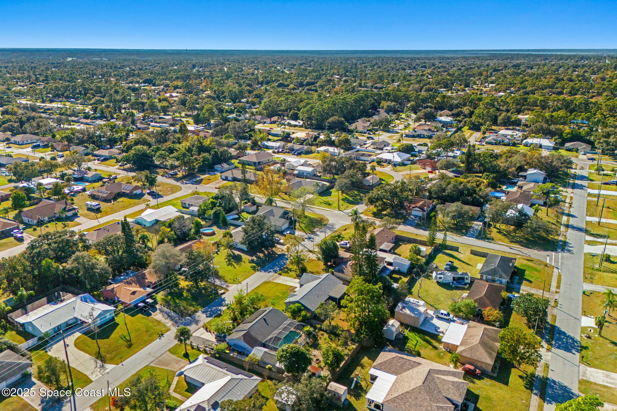 4852 Alfred Street Cocoa, FL 32927 - Photo 58 of 59 an aerial view of residential houses with outdoor space