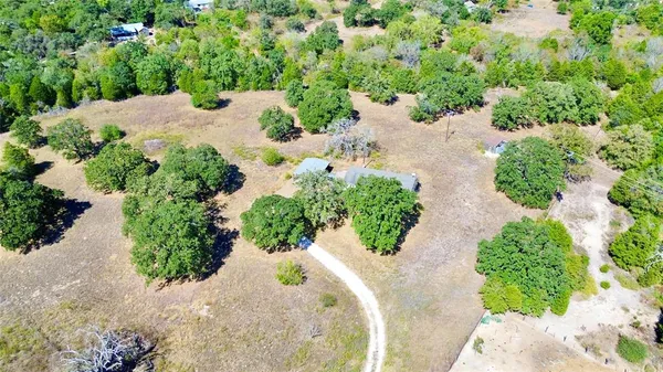 a view of a garden with pathway