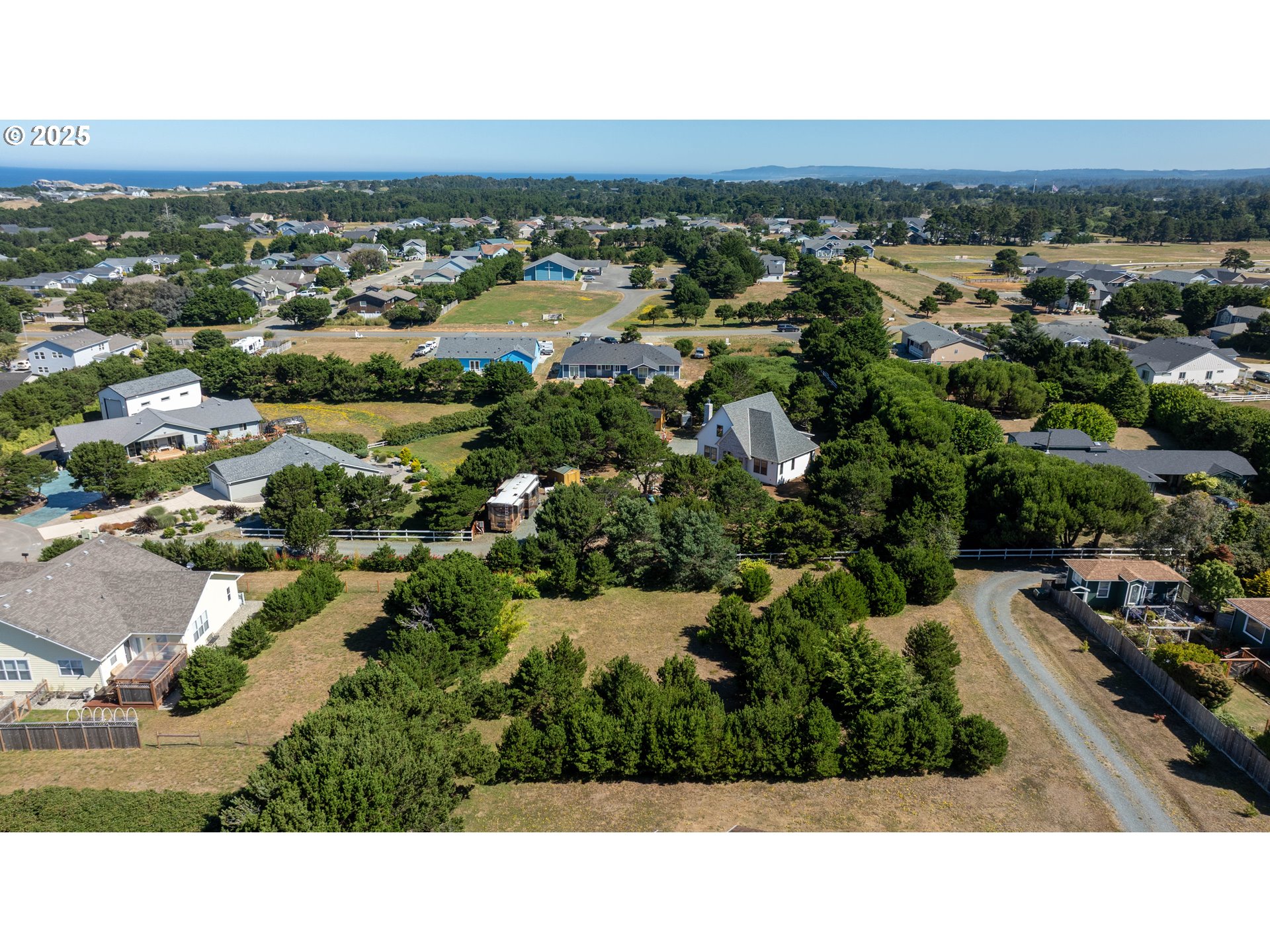 Grant Place, Unit 700 Bandon, OR 97411 - Photo 11 of 17 an aerial view of multiple house
