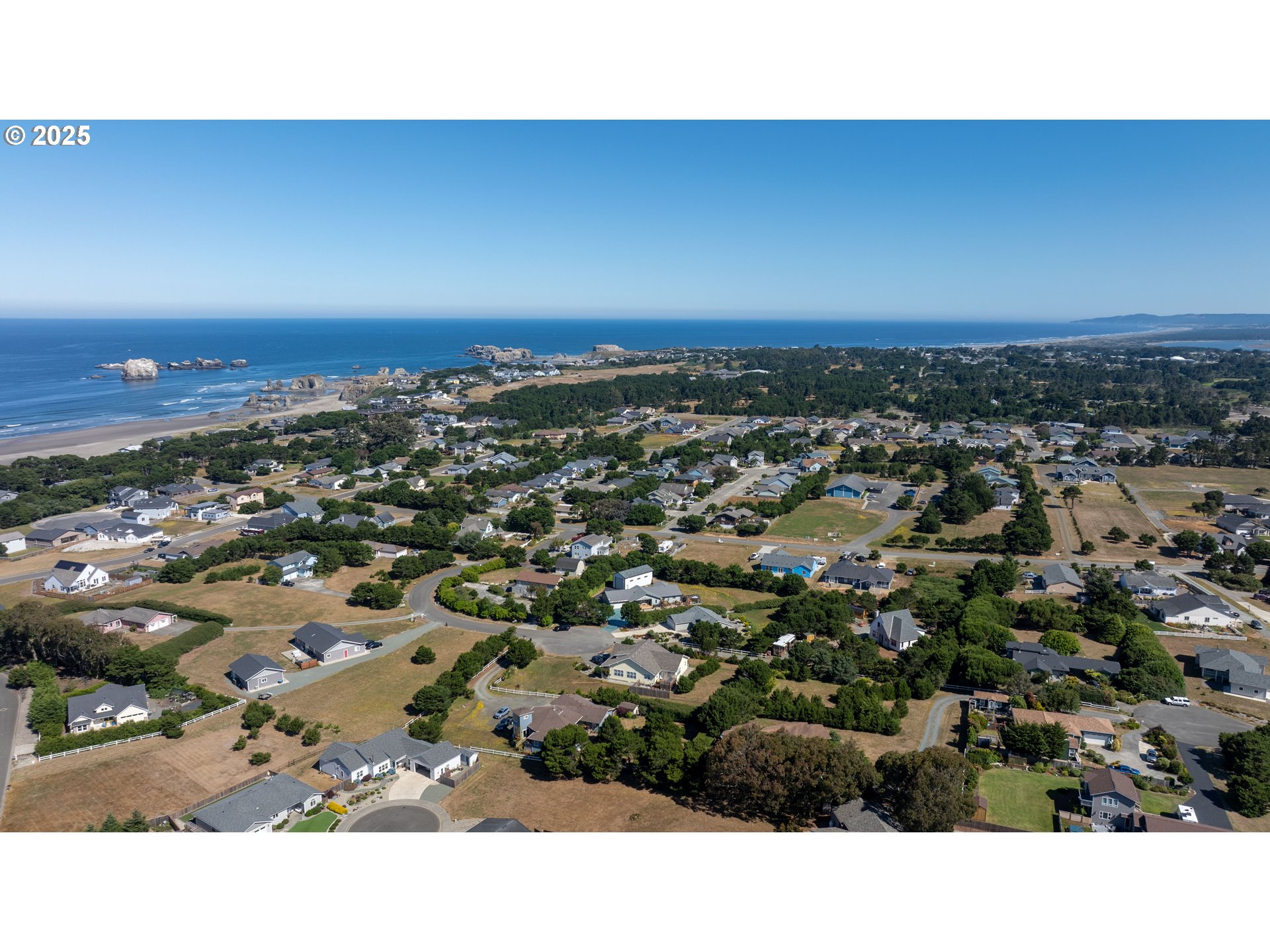 Grant Place, Unit 700 Bandon, OR 97411 - Photo 9 of 17 an aerial view of a house
