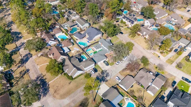 an aerial view of a city with lots of residential buildings