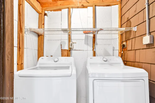 a view of a back yard of the house