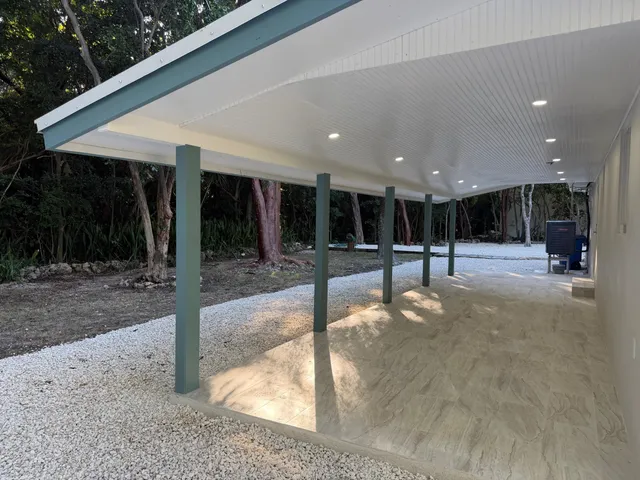 a view of a hall with wooden floor
