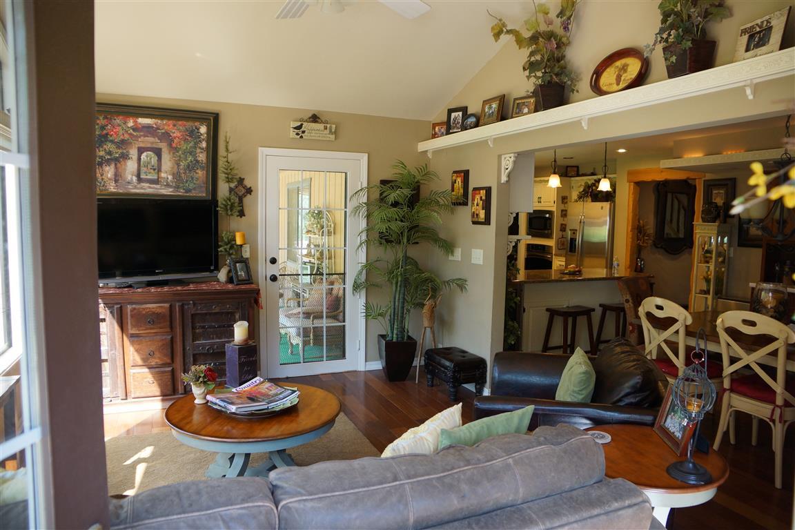 14388 Fern Road Whitmore, CA 96096 - Photo 19 of 52 a living room with furniture and a flat screen tv