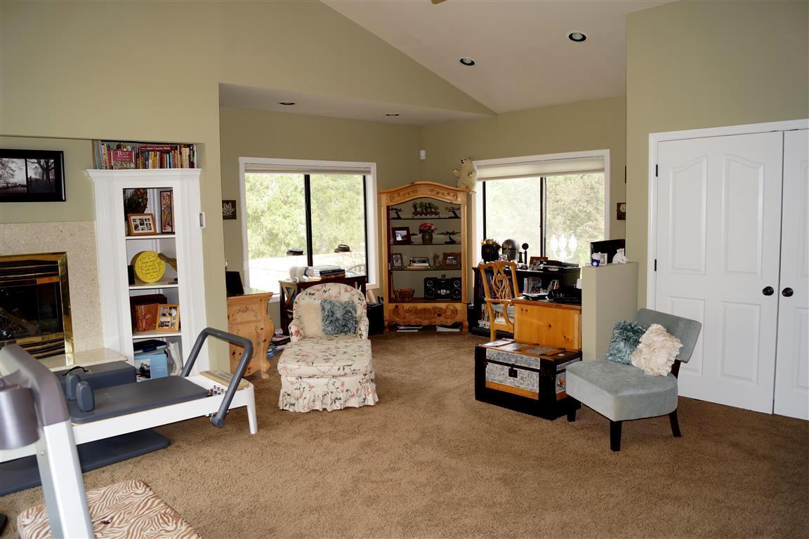 14388 Fern Road Whitmore, CA 96096 - Photo 21 of 52 a living room with furniture and a flat screen tv