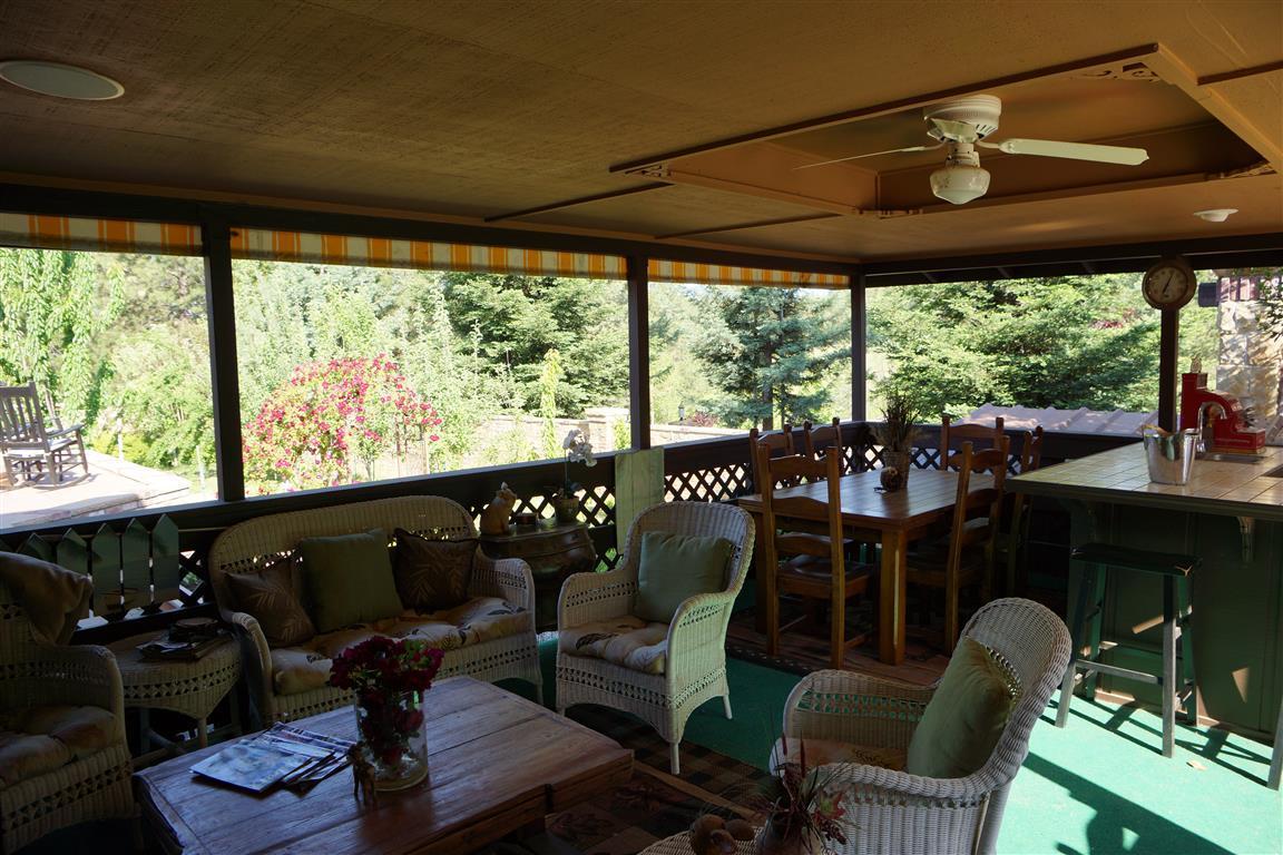 14388 Fern Road Whitmore, CA 96096 - Photo 23 of 52 a living room with furniture and a large window