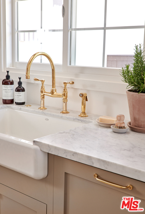 403 Emerald Way Lake Arrowhead, CA 92352 - Photo 11 of 30 a bathroom with a sink and a large window