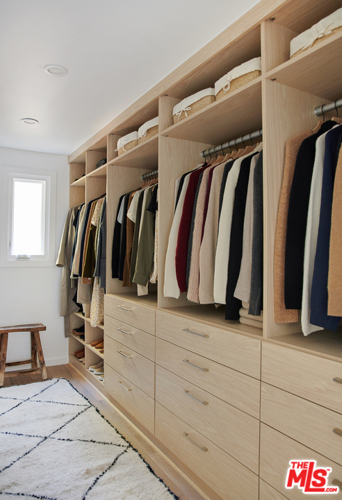 403 Emerald Way Lake Arrowhead, CA 92352 - Photo 13 of 30 a view of walk in closet with clothes