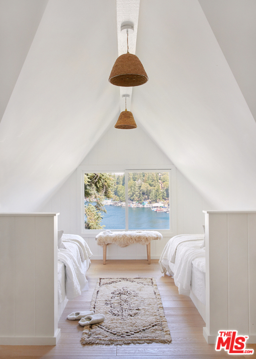 403 Emerald Way Lake Arrowhead, CA 92352 - Photo 15 of 30 a living room with a couch and a table