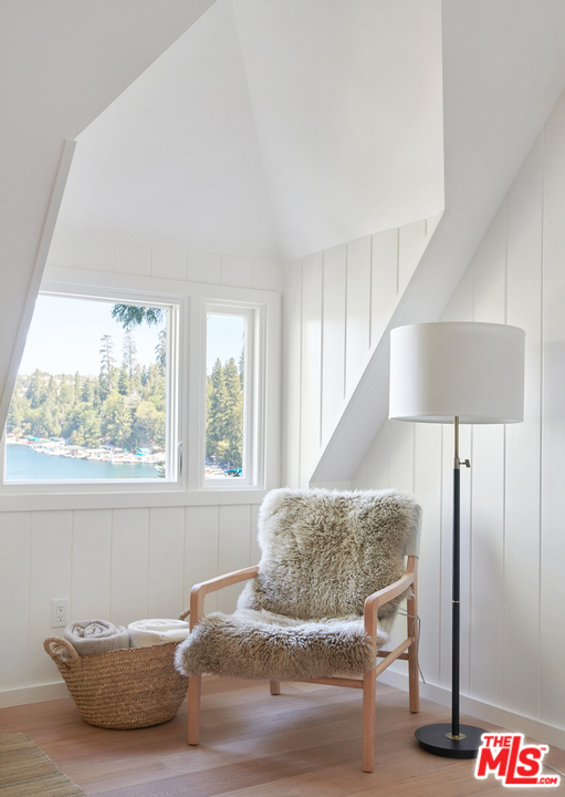 403 Emerald Way Lake Arrowhead, CA 92352 - Photo 20 of 30 a living room with a couch and a table