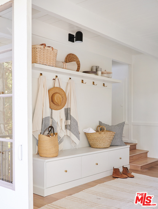 403 Emerald Way Lake Arrowhead, CA 92352 - Photo 25 of 30 a bathroom with a mirror and vanity