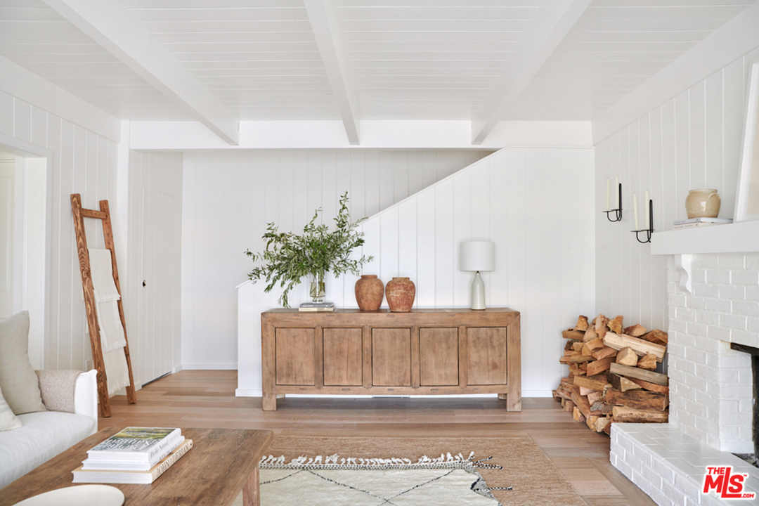 403 Emerald Way Lake Arrowhead, CA 92352 - Photo 5 of 30 a view of living room filled with furniture and a potted plant