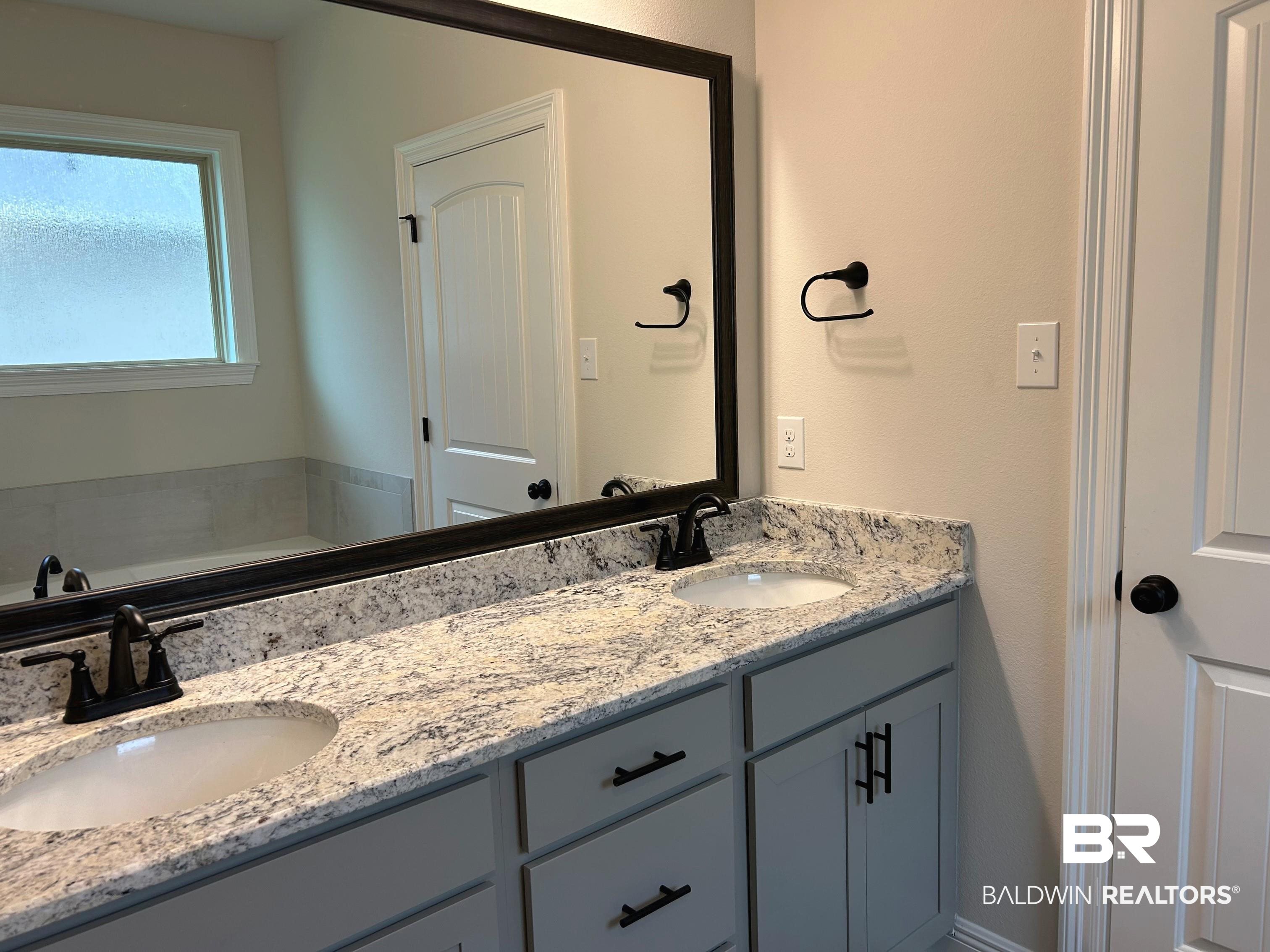 844 Sumter Loop Foley, AL 36535 - Photo 15 of 18 Bathroom featuring vanity