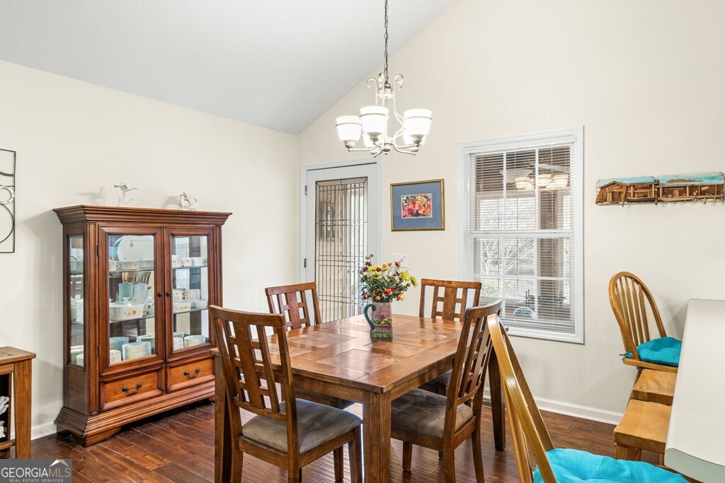 251 Rivers Edge Drive Hayesville, NC 28904 - Photo 17 of 45 a view of a dining room with furniture window and outside view