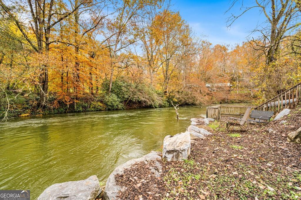 251 Rivers Edge Drive Hayesville, NC 28904 - Photo 2 of 45 a view of a lake with houses