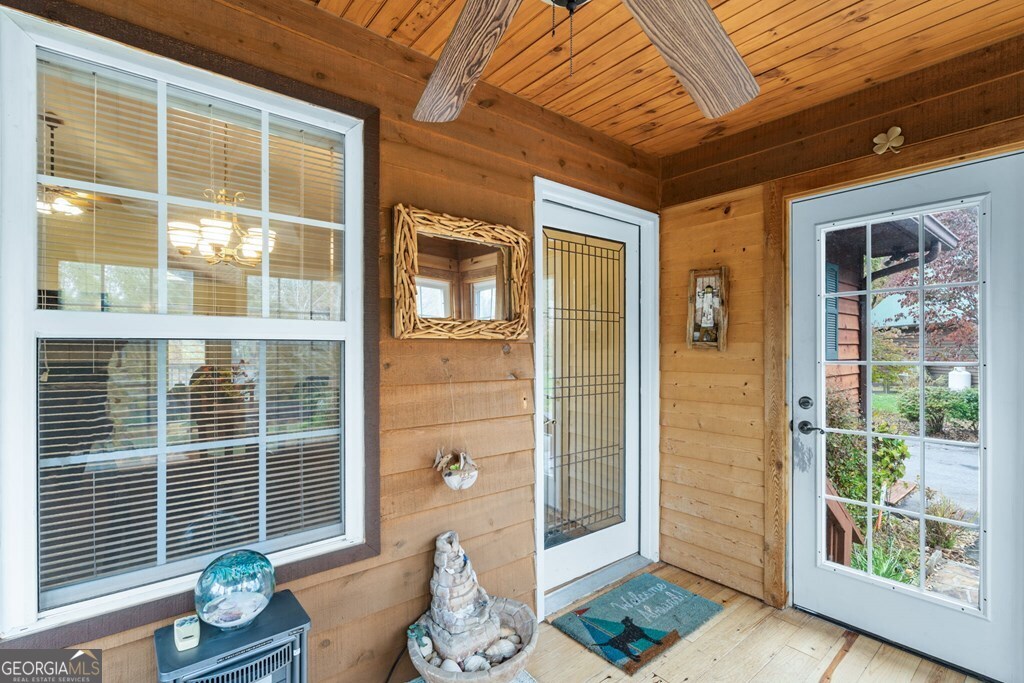 251 Rivers Edge Drive Hayesville, NC 28904 - Photo 28 of 45 a view of a porch with furniture