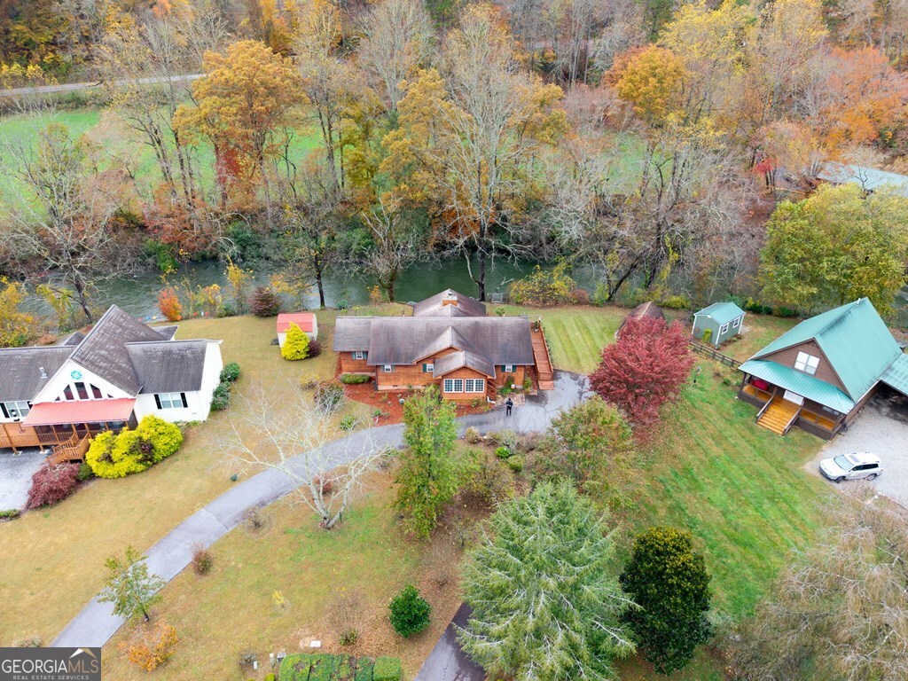 251 Rivers Edge Drive Hayesville, NC 28904 - Photo 29 of 45 an aerial view of a house with swimming pool and lake view